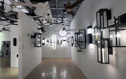 Showroom with lots of wall fixtures and ceiling fans